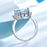 Sterling Silver Emerald Cut 7 * 9MM Sky Blue Aquamarine and White Moissanite  Engagement Ring